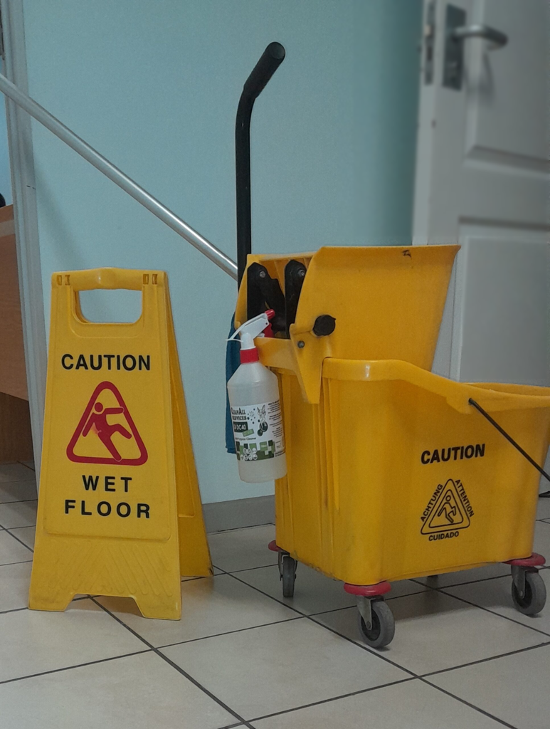 Bucket-and-caution-sign